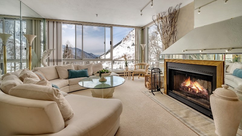 Room with a fireplace in Alta Chalets