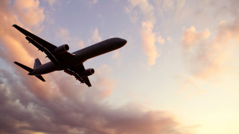 airplane in the sky - The Best Way to Get to Snowbird